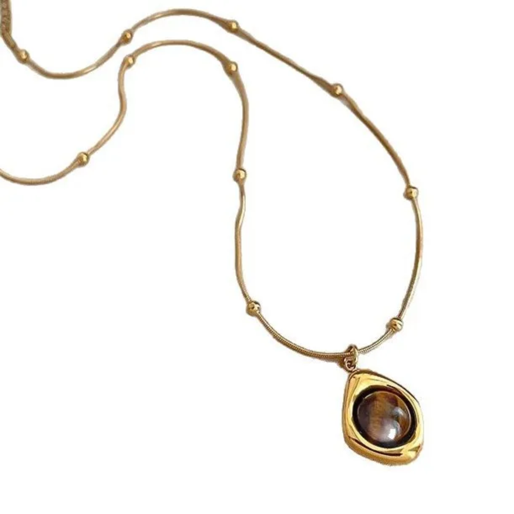 METAMORFOSI -  Collana con pendente occhio di tigre